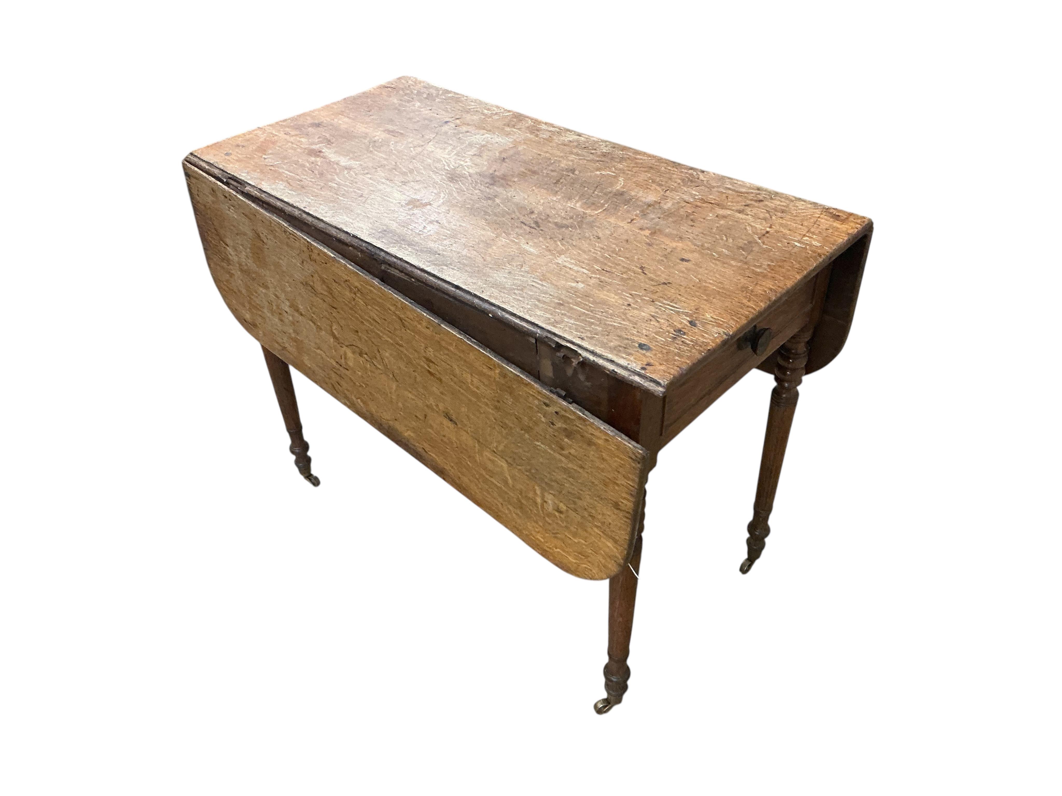 An early 19th century oak drop flap table, in need of restoration, width 91cm, depth 48cm, height 70cm